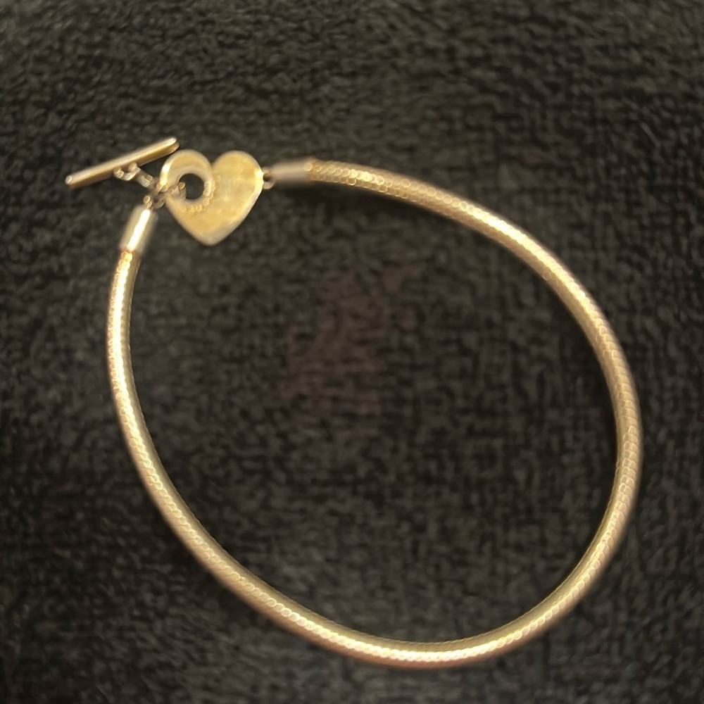 Pandora, gold toned bracelet. Good condition